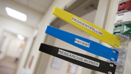 Signs outside a patient exam room 