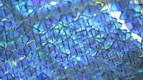 A sculpture in the Ernest Mario School of Pharmacy