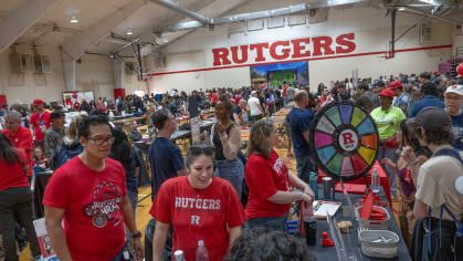 Crowds fill the Cook Recreation Center during Rutgers Day 2025.