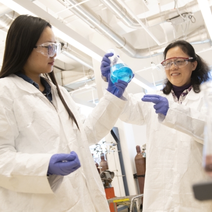 Graduate student works with a professor in the ChemBio lab