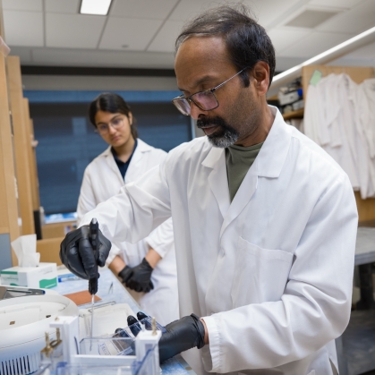 RITMS researchers work in a lab at Rutgers