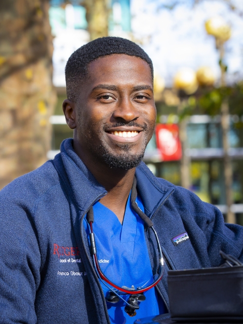 A student enjoys a crisp fall day on the RBHS campus in Newark
