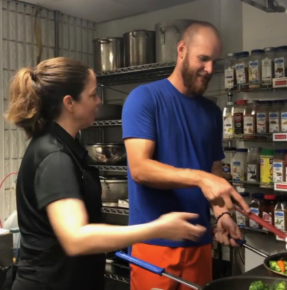 Theresa Corderi is seen in the kitchen cooking with former NY Mets pitcher Zack Wheeler 