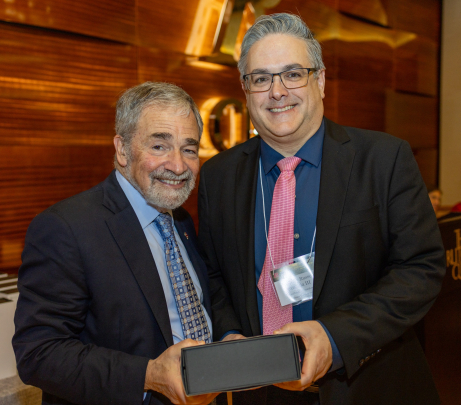 Chancellor Strom and Anthony Russell Rosania III, recipient of the Excellence in Clinical or Healthcare Delivery Award.